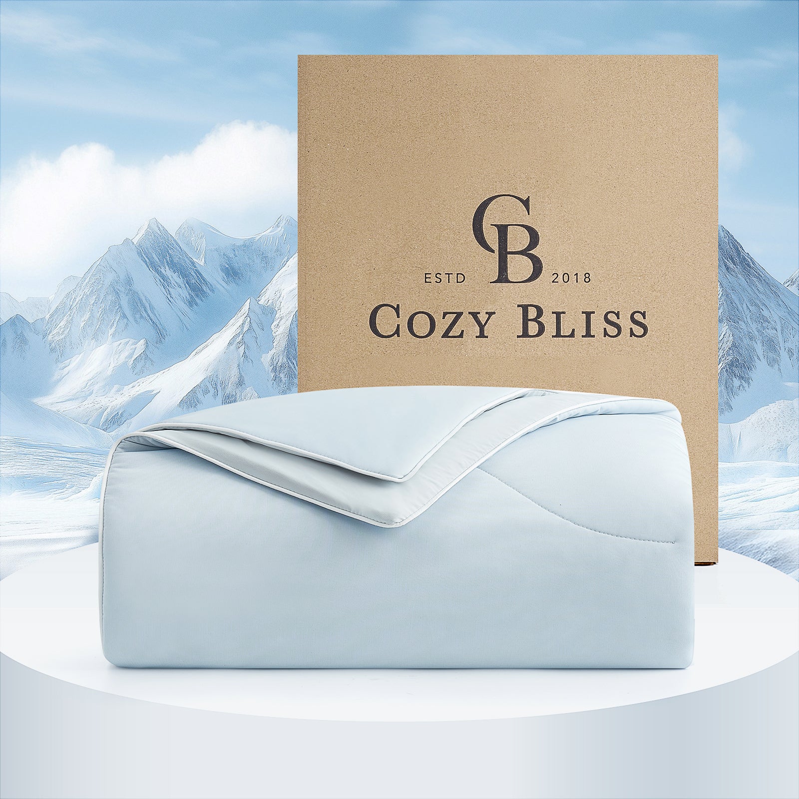Light blue Cozy Bliss cooling comforter with the brand logo and packaging #Color_Cool Blue