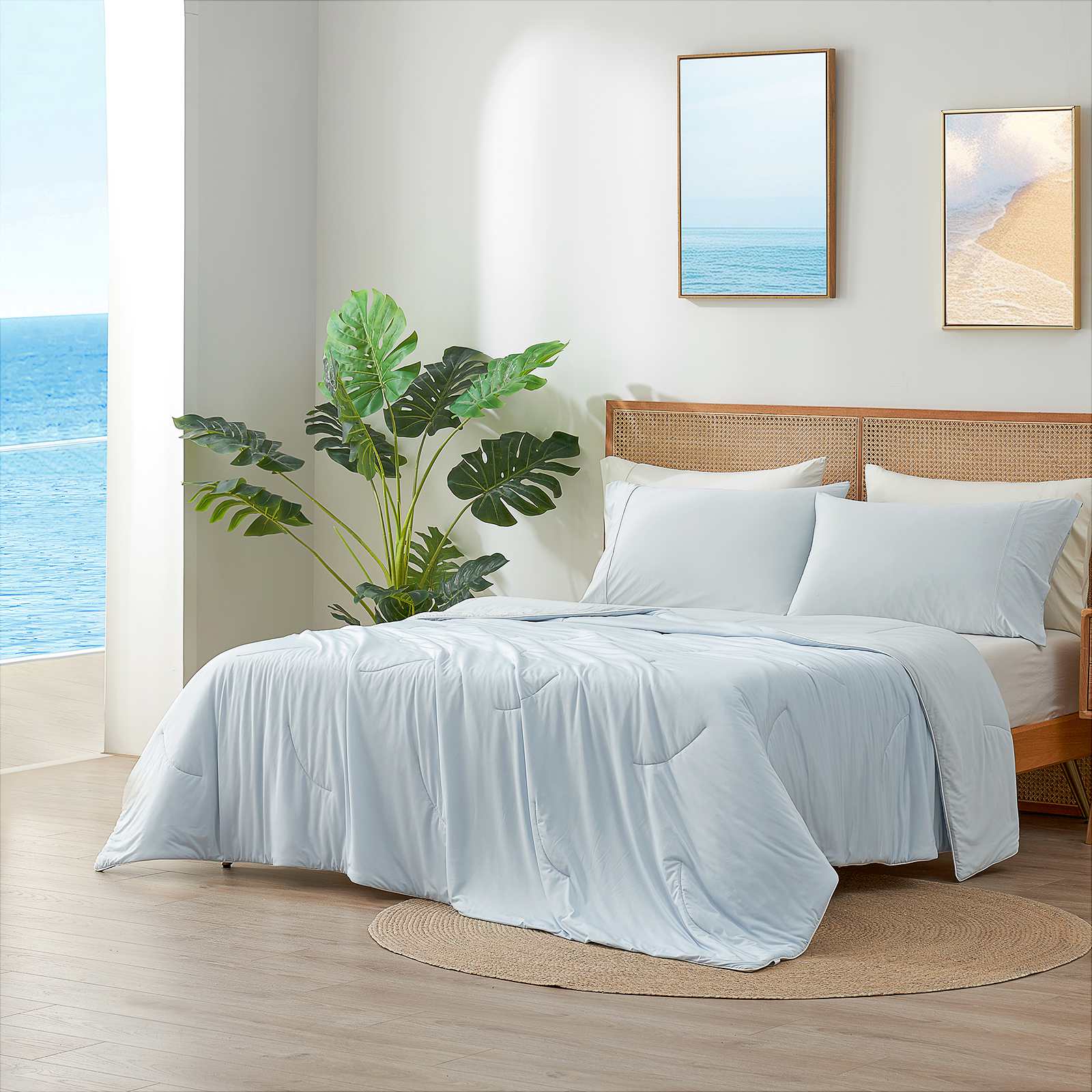 Light blue cooling comforter on bed, breathable design for hot sleepers, premium Cozybliss bedding #Color_Cool Blue