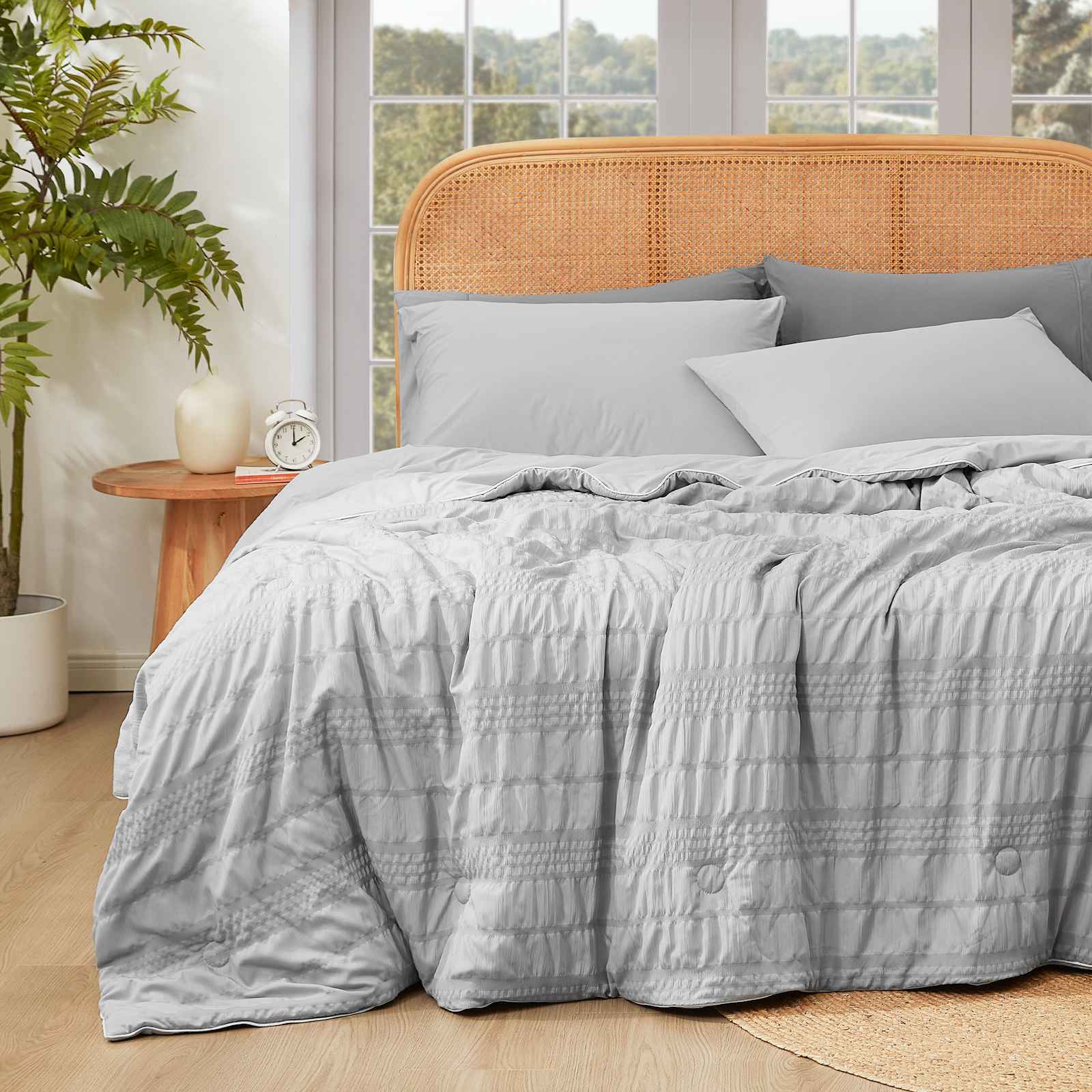Gray Seersucker Cooling Comforter. Breathable and cozy bedding for a comfortable sleep. #color_Light Grey