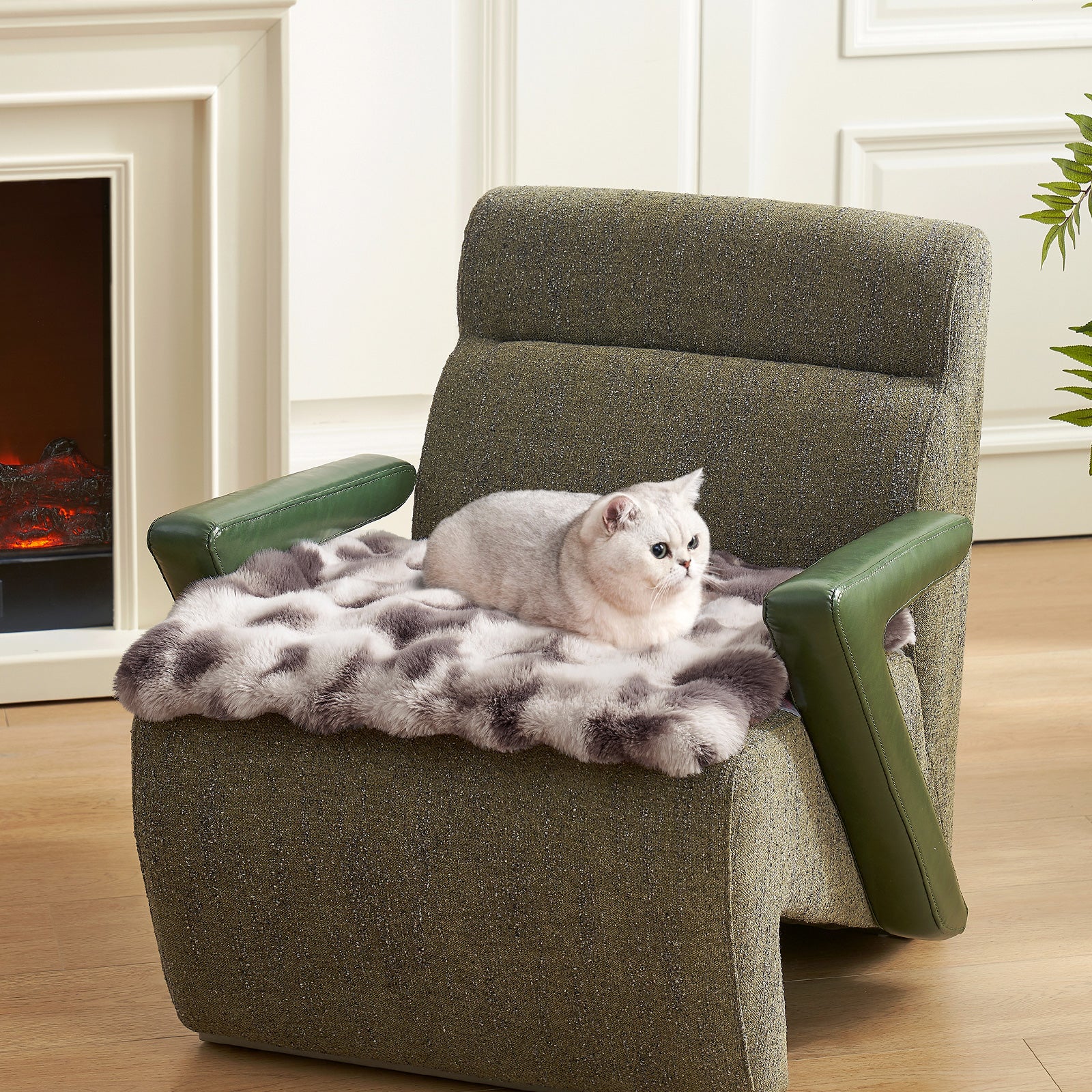 Cat sitting on a tie-dye blue fluffy couch cover on a brown armchair in a cozy living room.#color_Tie-dye Grey