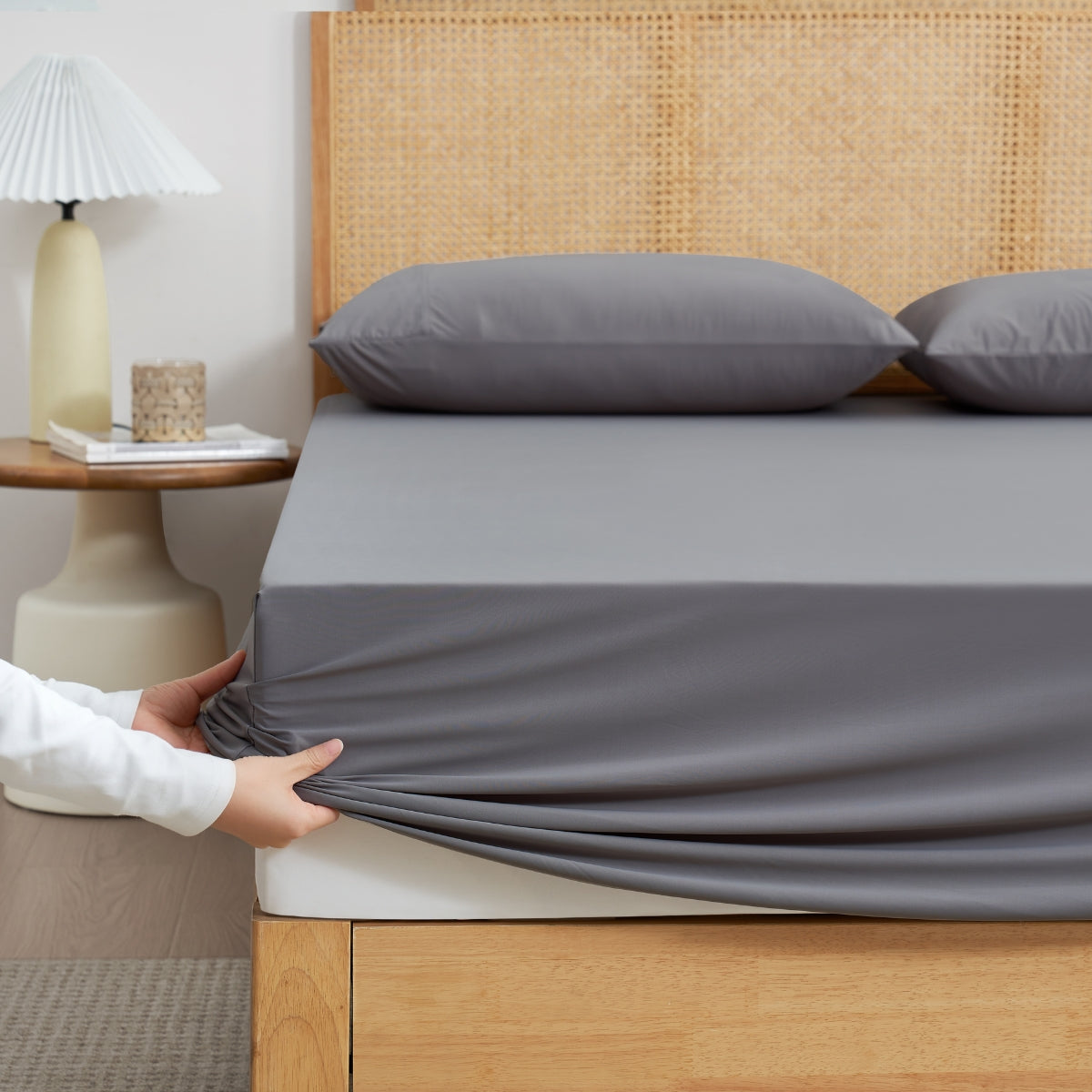 Cozy Bliss Cream-colored cooling fitted sheet set with pillowcases front view. #Color_Dark Grey