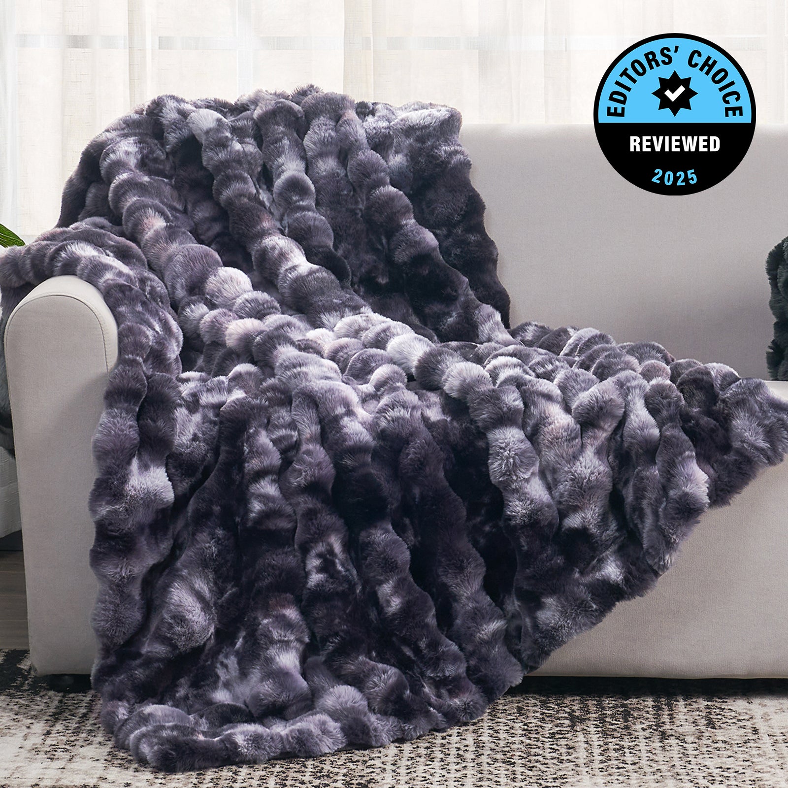 Gray textured blanket draped over a white couch with 'Editors' Choice' badge in the corner. #Color_Tie-dye Black