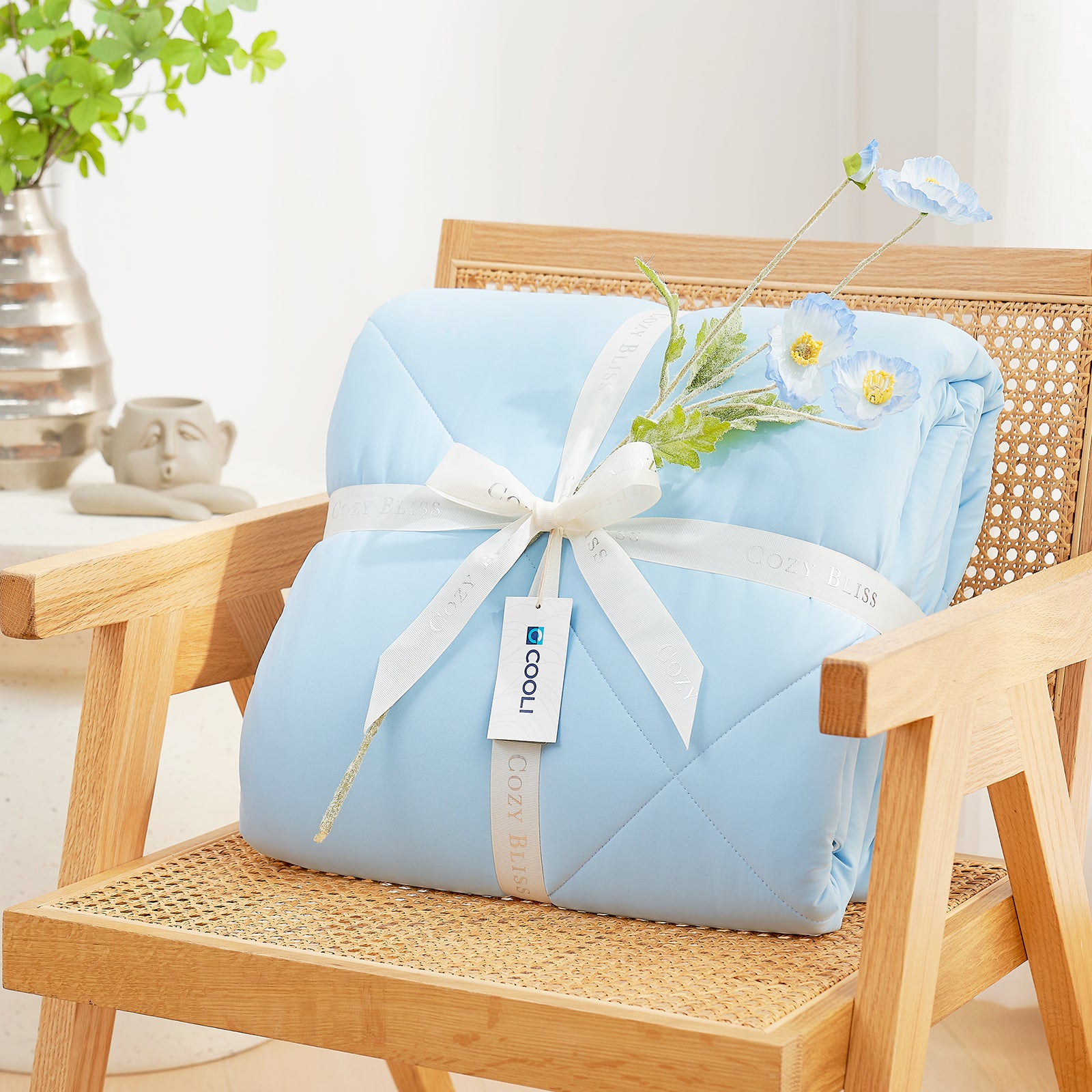 Cozy Bliss light blue cooling comforter gift, perfect for hot sleepers, with COOLI tag #Color_Sky Blue