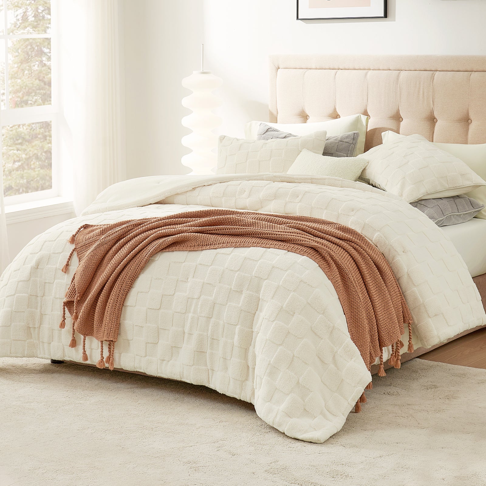 Cozy Bliss Fluffy Checkered Sherpa Bed Set on a Bed