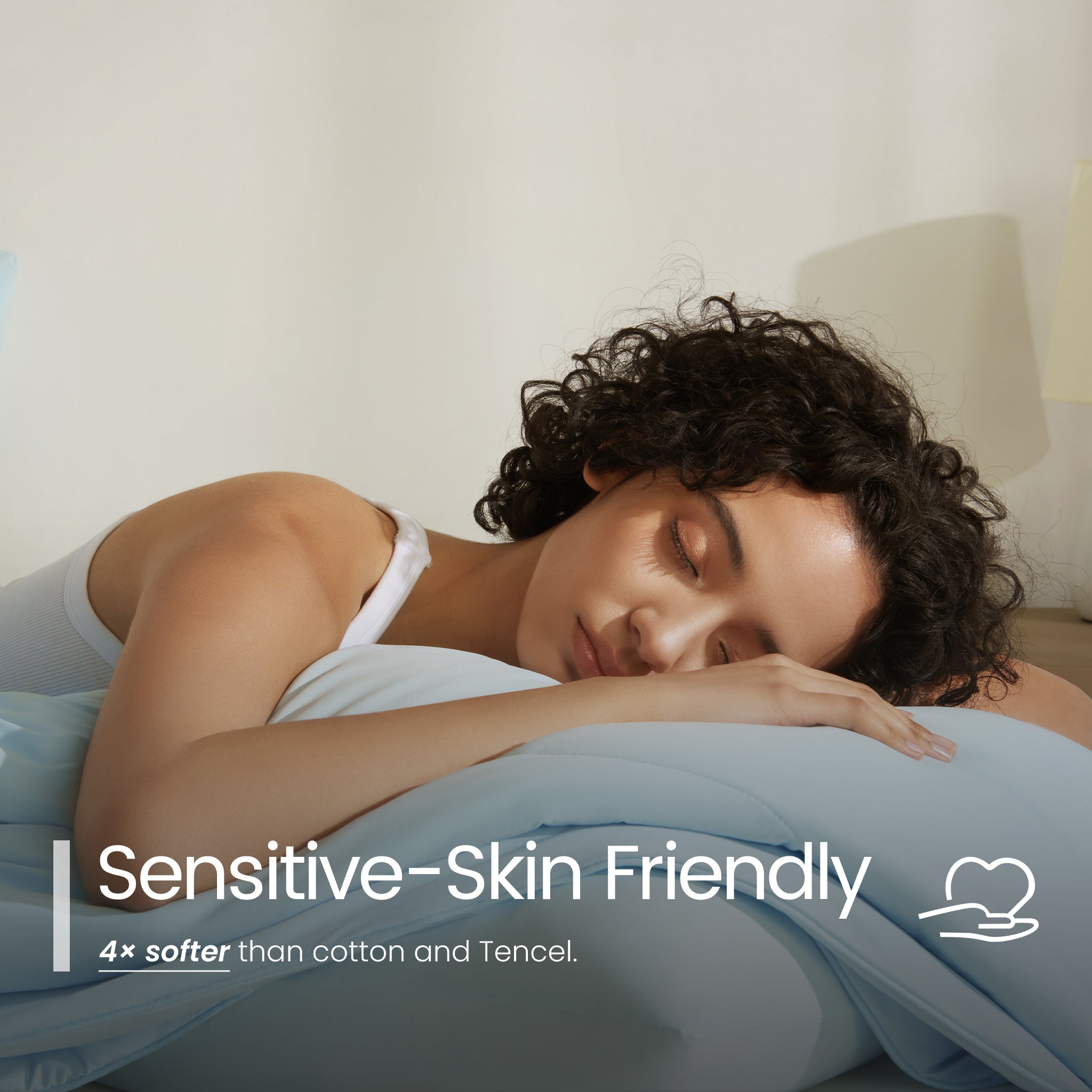 Woman sleeping peacefully with 'Sensitive-Skin Friendly' text overlay#color_Sky Blue