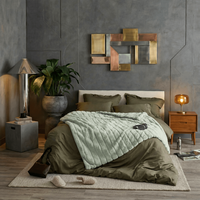 Cozy Bliss faux fur blanket styled on a modern bed, creating a calm and earthy bedroom atmosphere #color_Sage Green