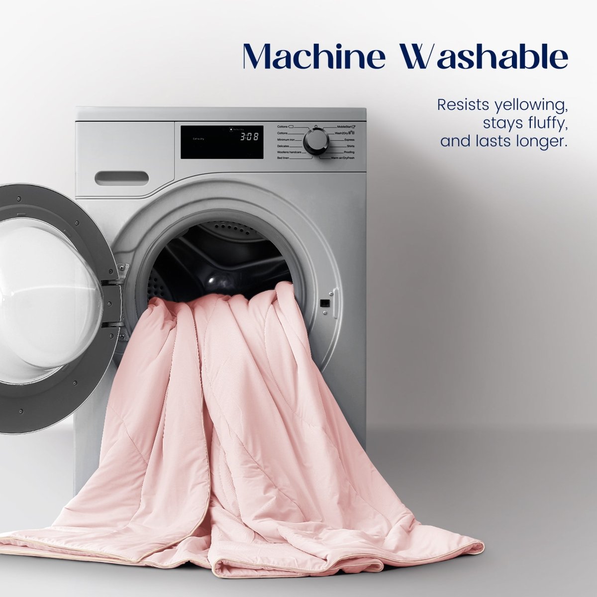 Pink blanket draped over a washing machine with text about machine washability.#color_Pink