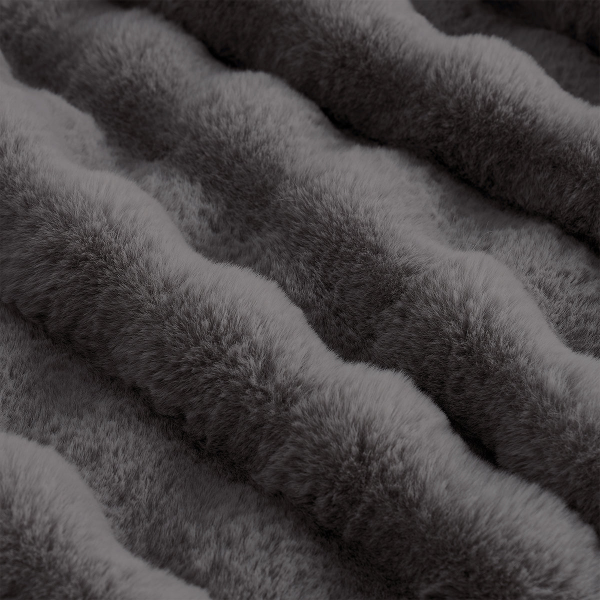 Close-up of a faux fur charcoal grey blanket fabric. #Color_Charcoal Grey