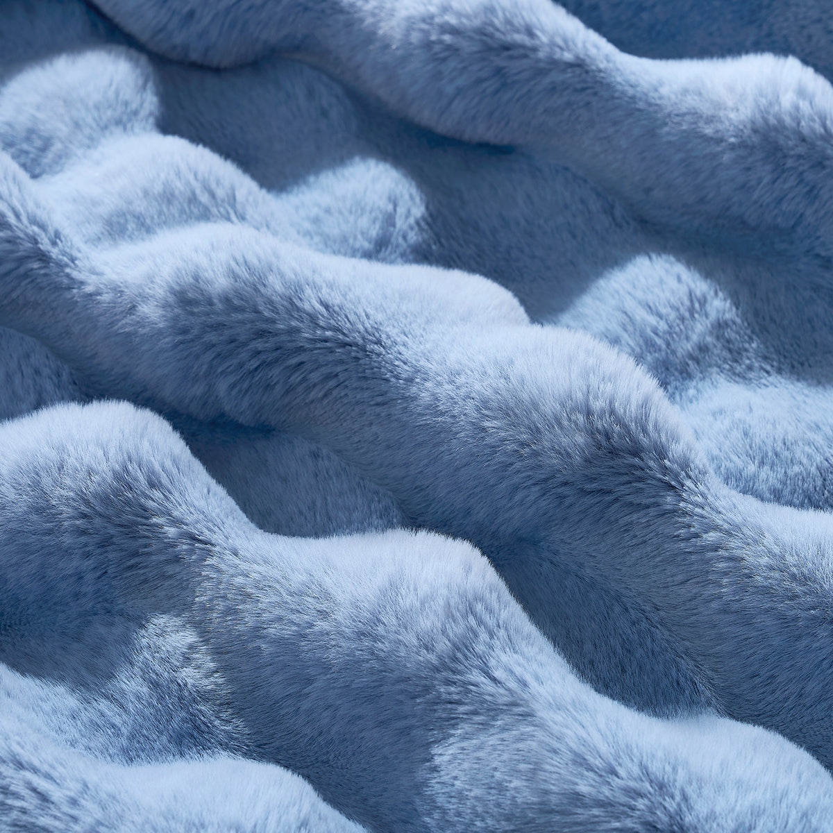 Close-up of a faux fur misty blue blanket fabric. #Color_Misty Blue