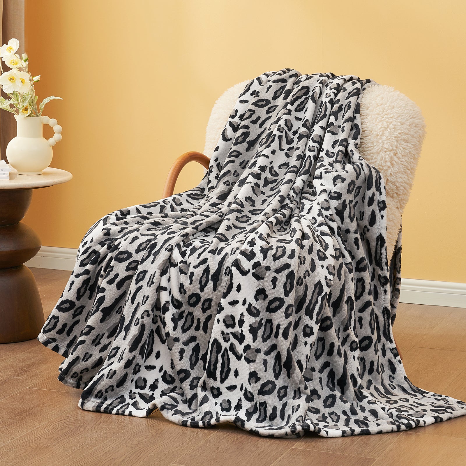 Leopard print throw blanket on a chair, featuring soft, cozy blanket #color_Silvery Leopard