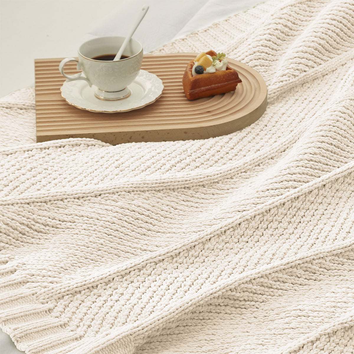 Chevron Chenille Knit Throw Blanket in Ivory close-up view, showcasing soft chenille yarn and elegant chevron knit texture. #color_Ivory
