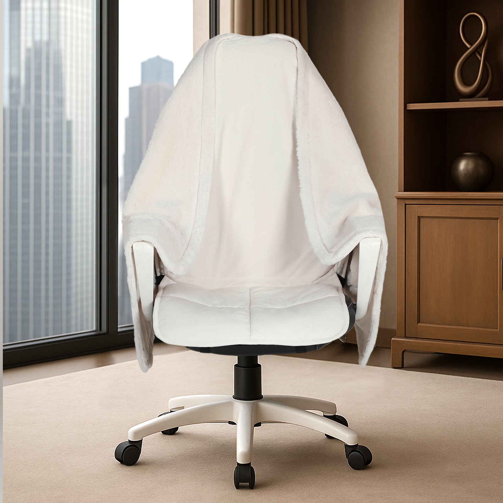 White office chair with a cloth draped over it in an office setting. #color_Beige