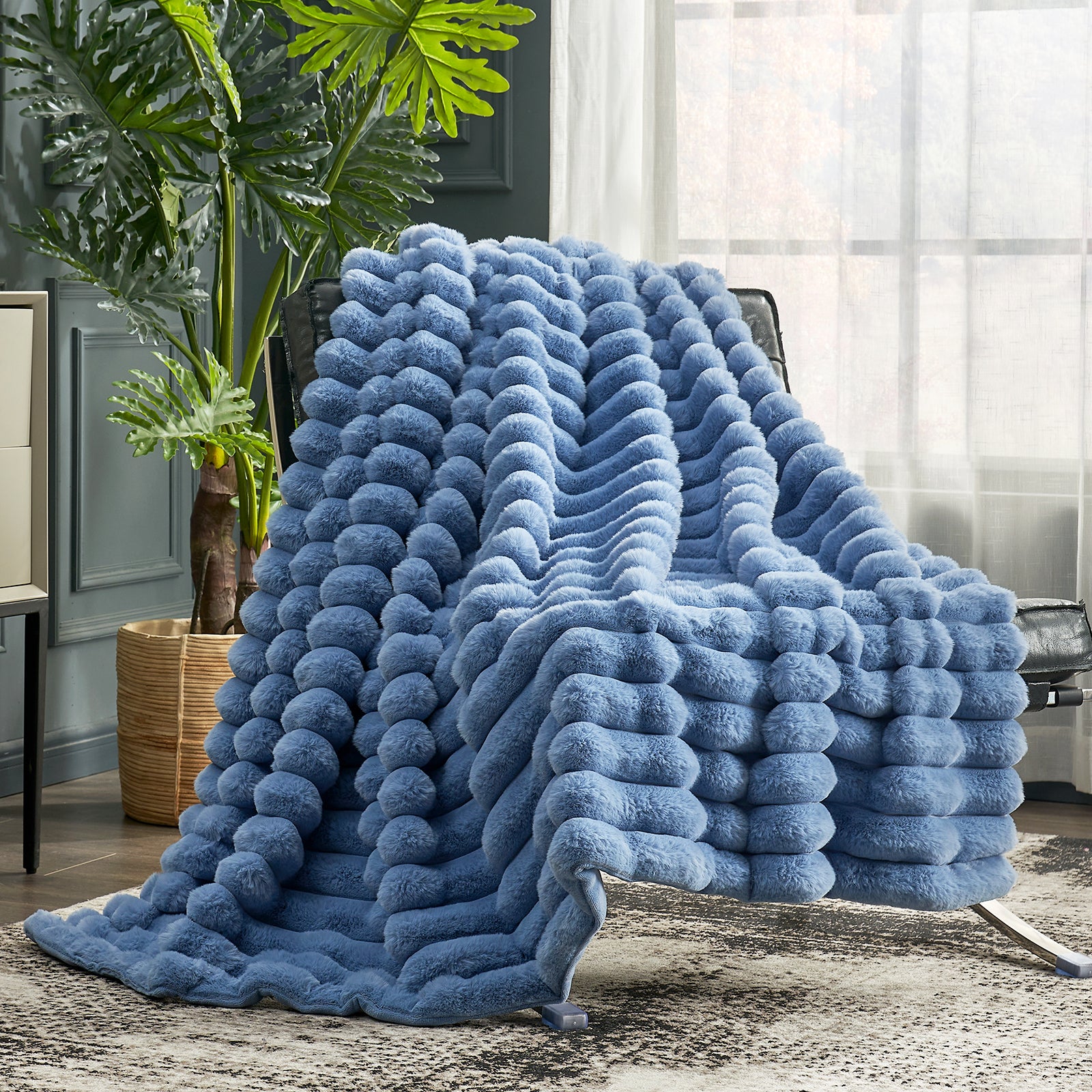 Cozy Bliss blue faux fur throw blanket on a chair, soft and cozy bedding. #color_Light Blue