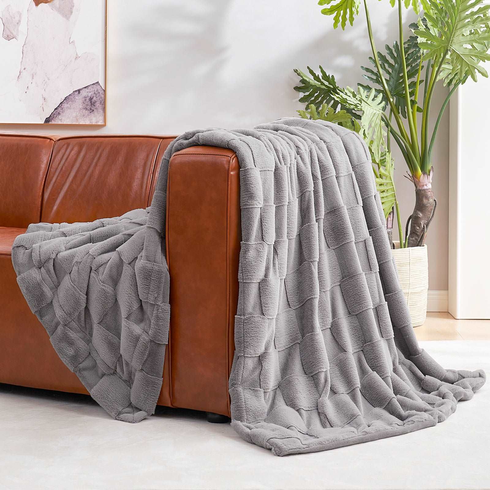 Gray checkerboard faux fur blanket on brown sofa, cozy living room decor, soft blanket #color_Grey