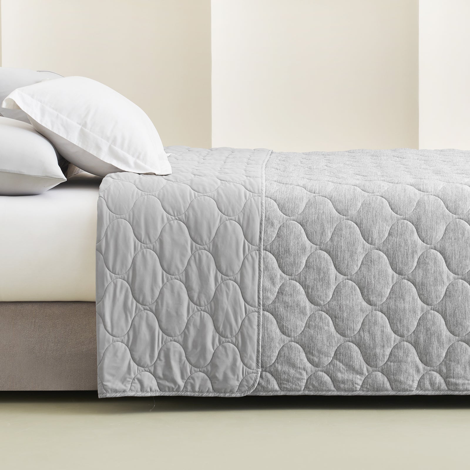 Gray double-sided cooling blanket on bed, cloud pattern #color_Silver Grey