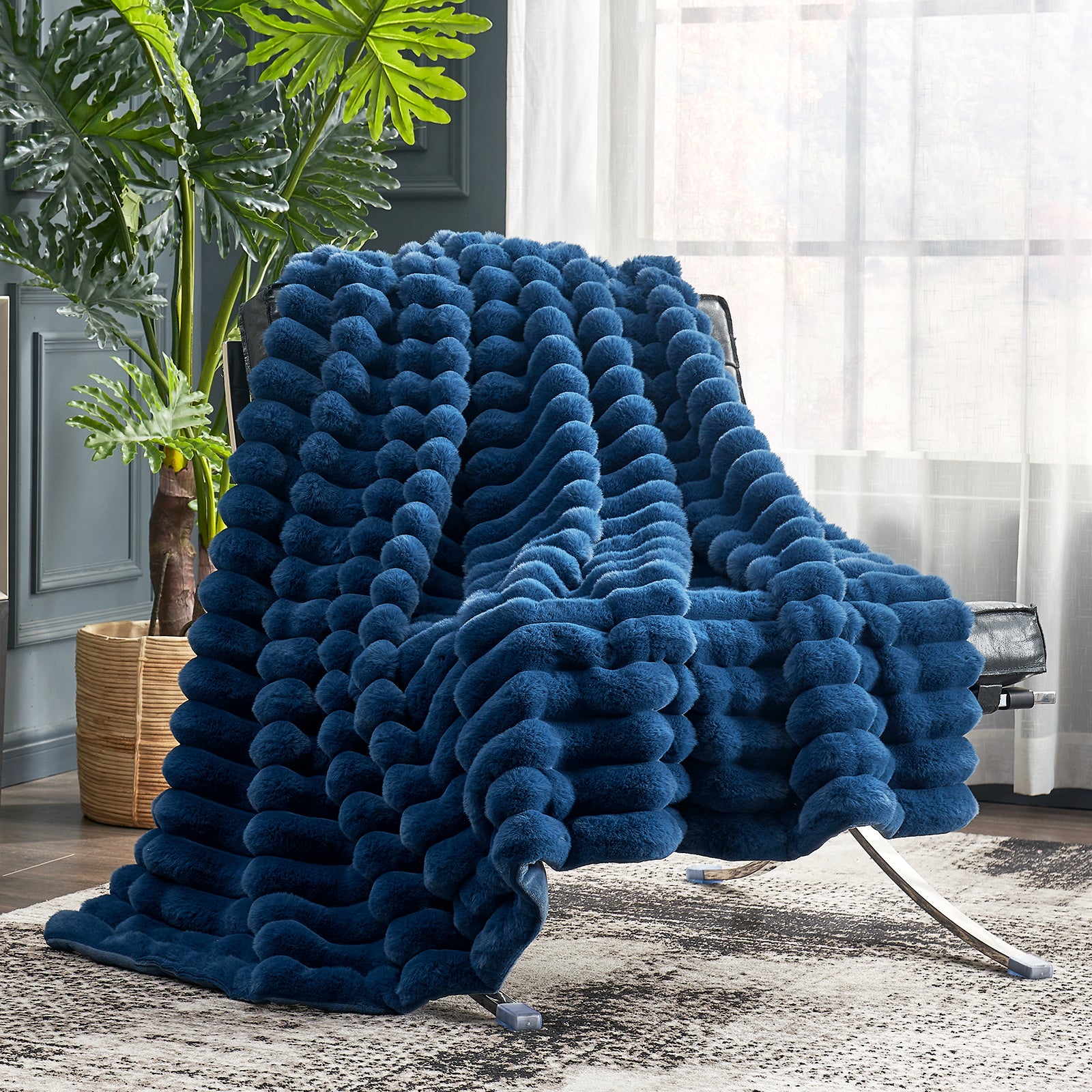 Cozy Bliss blue striped faux fur throw blanket on a chair, cozy comfort. #color_Navy Blue