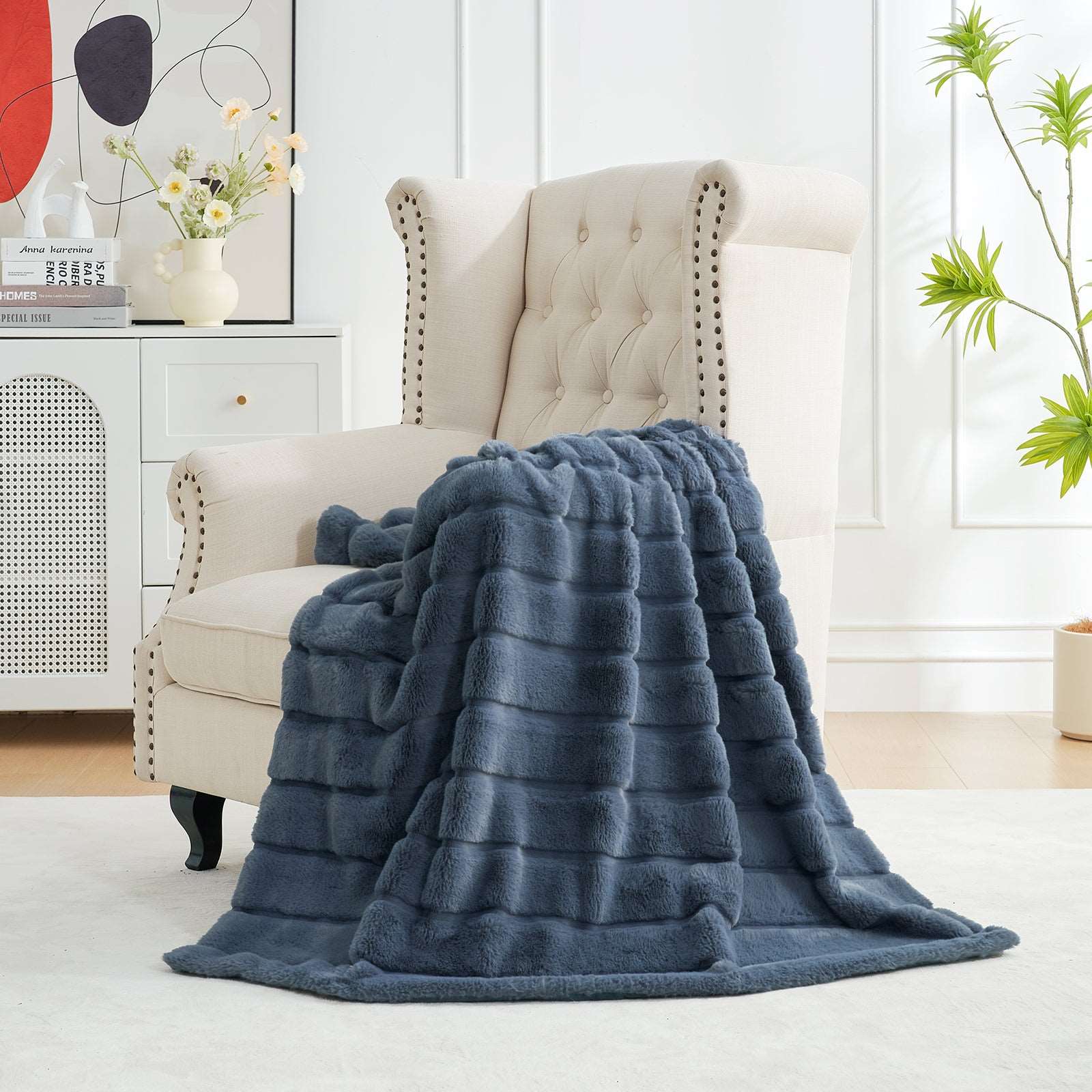 CozyBliss blue faux fur throw blanket on armchair, perfect for a cozy living space and a premium comfort #color_Blue