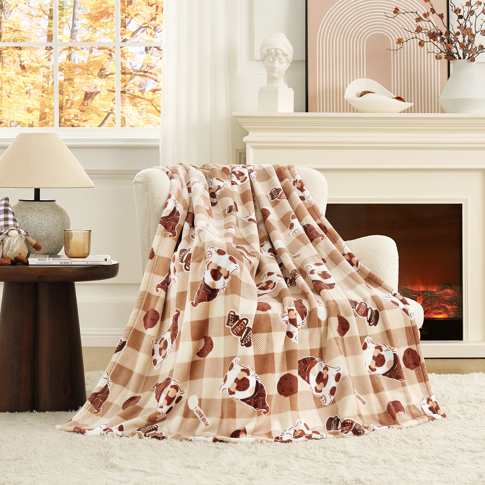 Floral-patterned throw blanket draped over a chair in a cozy living room with a fireplace. #color_Coffee Gnome Brown