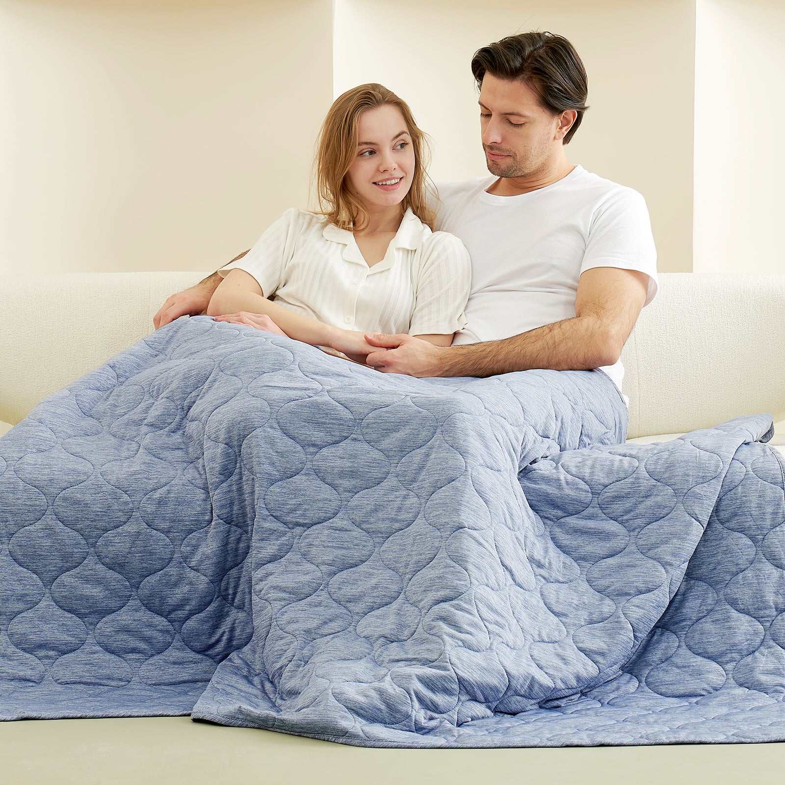 Couple relaxing under Cozy Bliss cooling blanket in blue cloud pattern, for cozy sleep #color_Denim Blue
