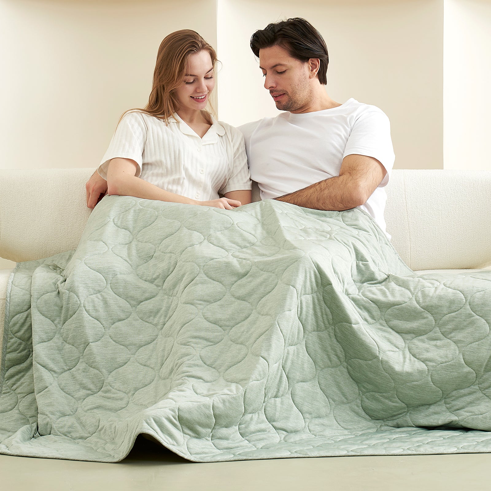 Couple relaxing with cooling blanket, cozy and breathable #color_Sage Green