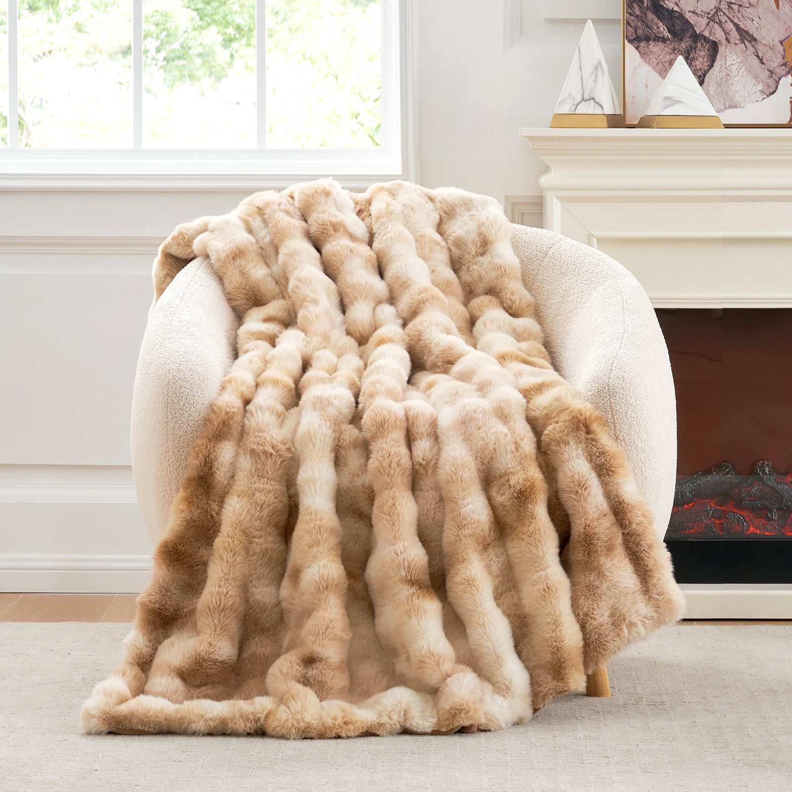 Cozy Bliss beige faux fur throw blanket on a white sherpa chair, a cozy and soft blanket for comfort #Color_Tie-dye Beige