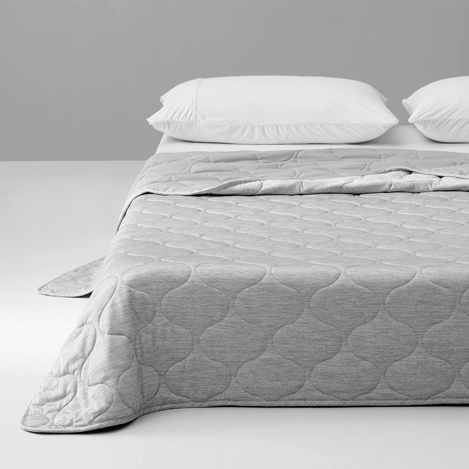 Cozy Bliss light gray cooling blanket with cloud pattern. Breathable and soft for cozy bedroom. #color_Silver Grey