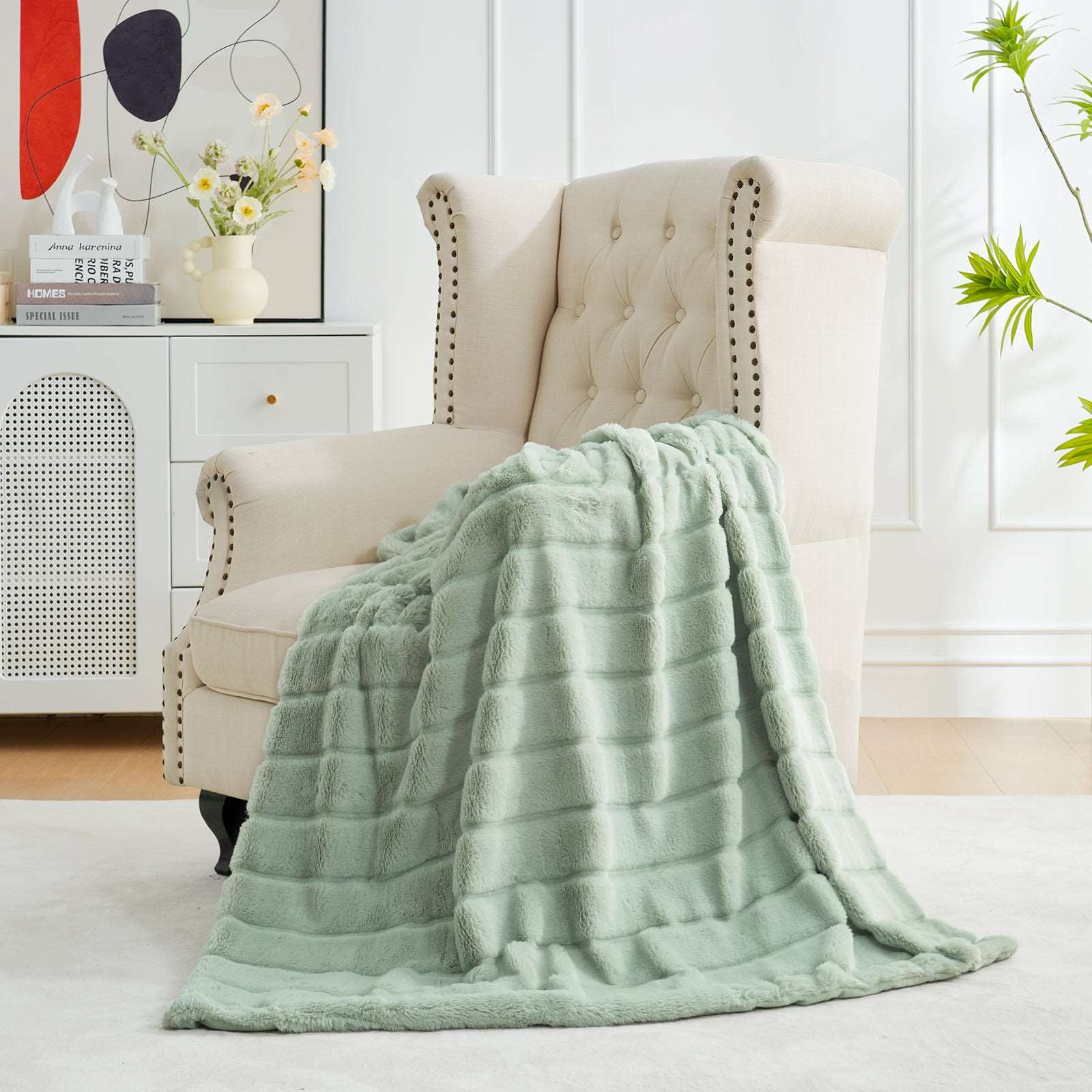 Cozy Bliss green faux fur throw blanket on beige armchair, home decor #color_Sage Green