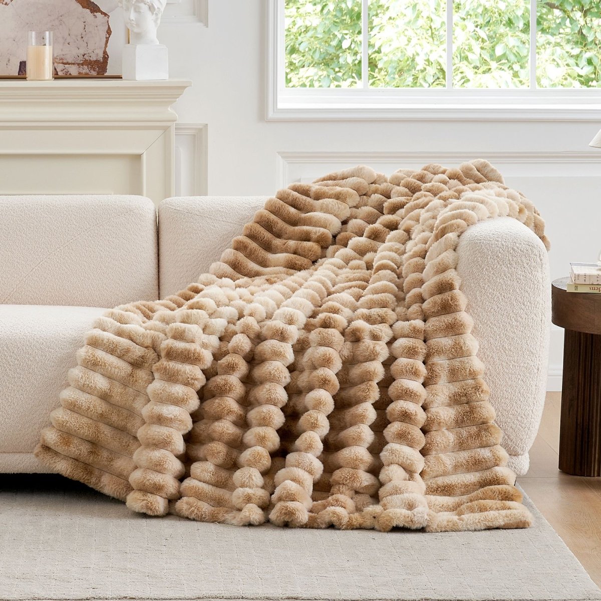 Cozy Bliss tie-dye beige striped faux fur blanket draped on a sofa. Cozy bedding and soft blanket. #color_Tie-dye Beige