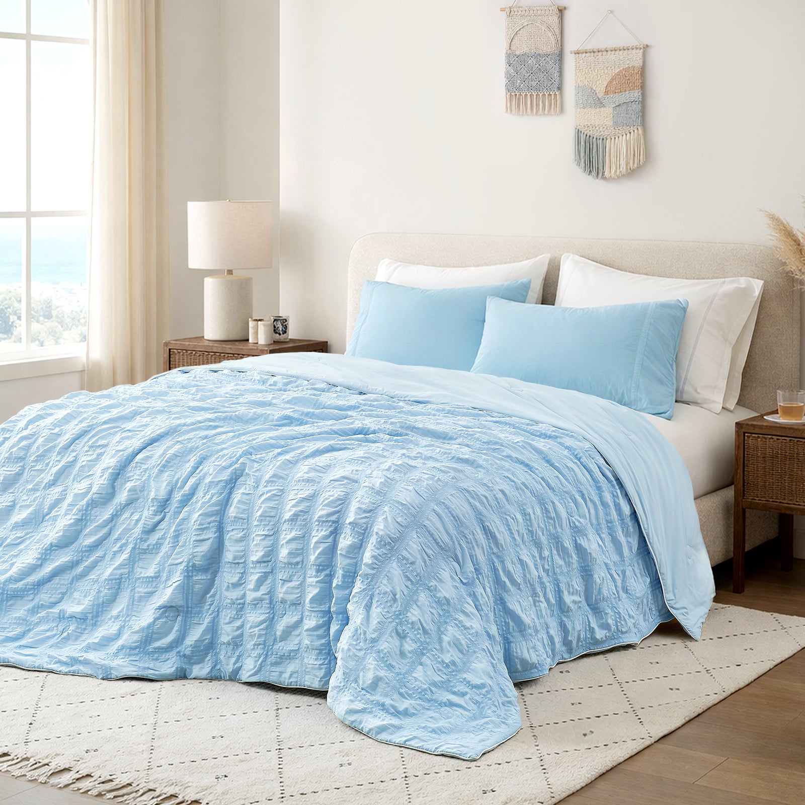 Cozy Bliss blue seersucker cooling comforter in bright coastal bedroom, breathable lightweight bedding with textured fabric.#Color_Blue Plaid