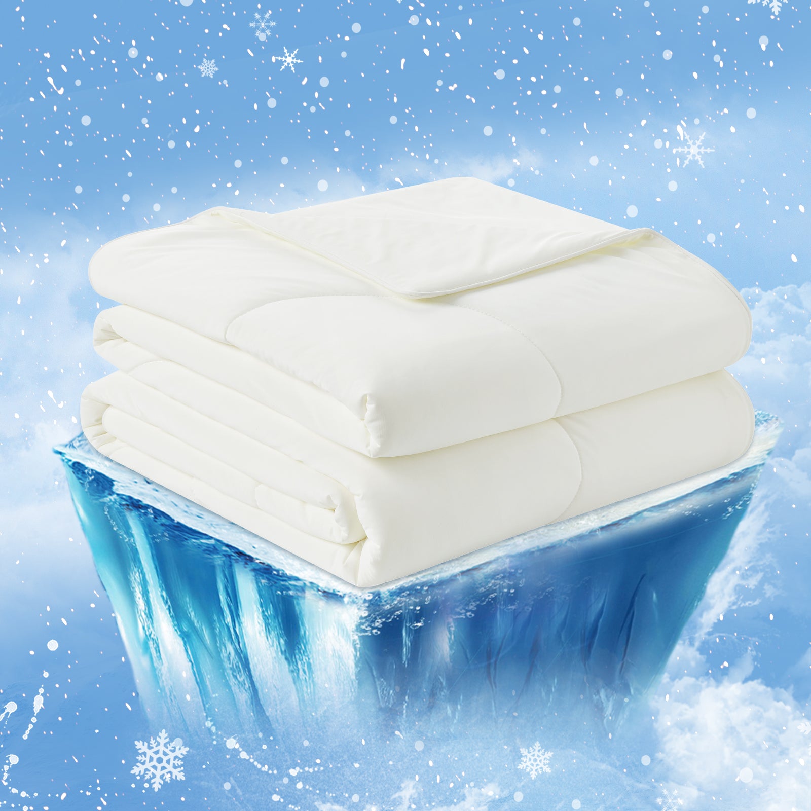 White cooling comforter, stacked on ice, designed for cool and comfortable sleep on hot nights. #Color_Off White