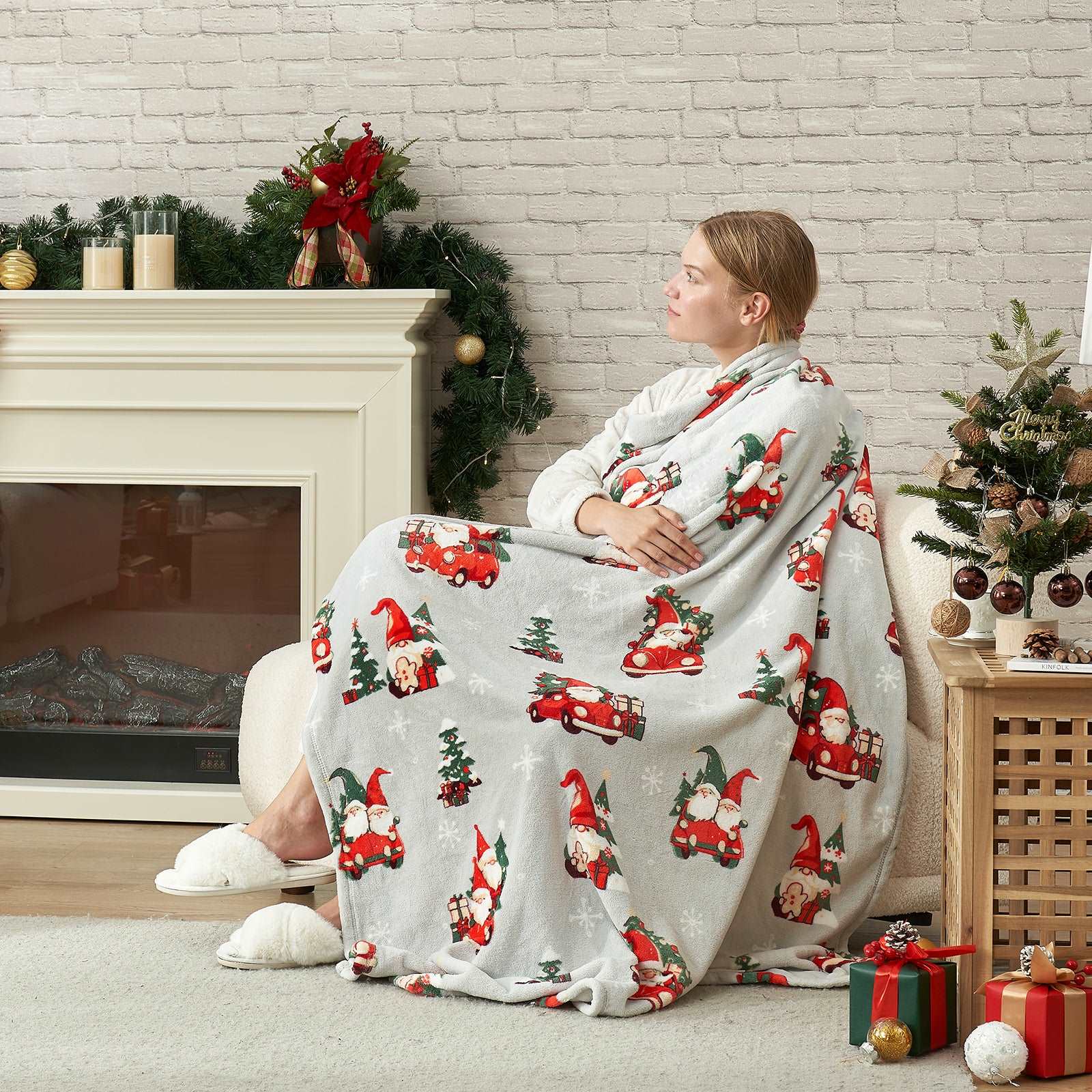 Woman wrapped in Gnomes MilkyPlush™ throw blanket, cozy winter comfort #color_ Gnome in Truck