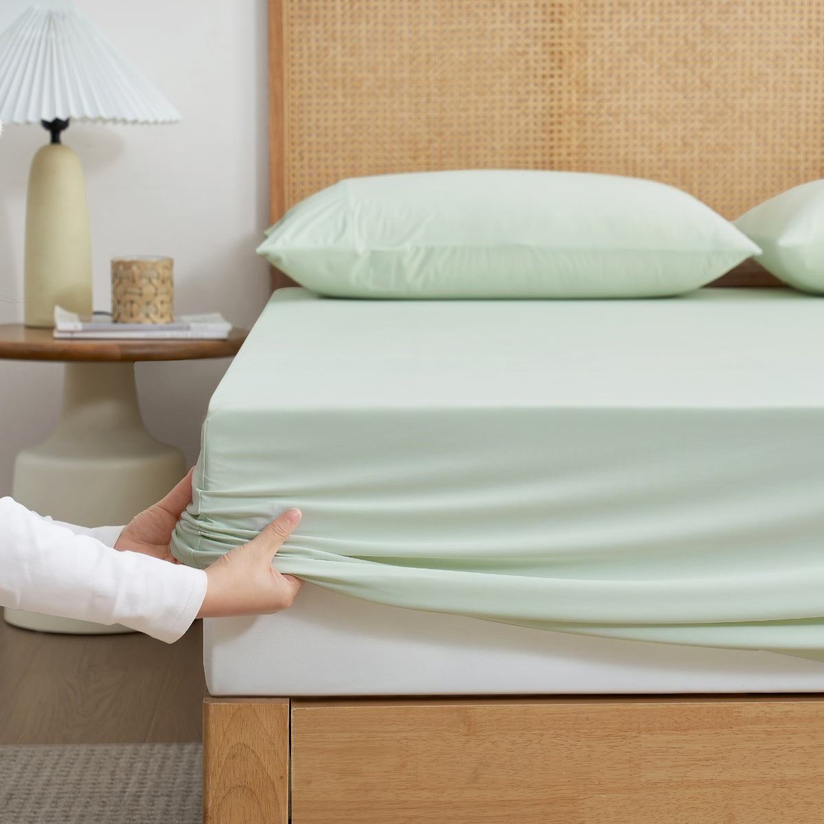 Cozy Bliss Cream-colored cooling fitted sheet set with pillowcases front view. #Color_Light Mint Green