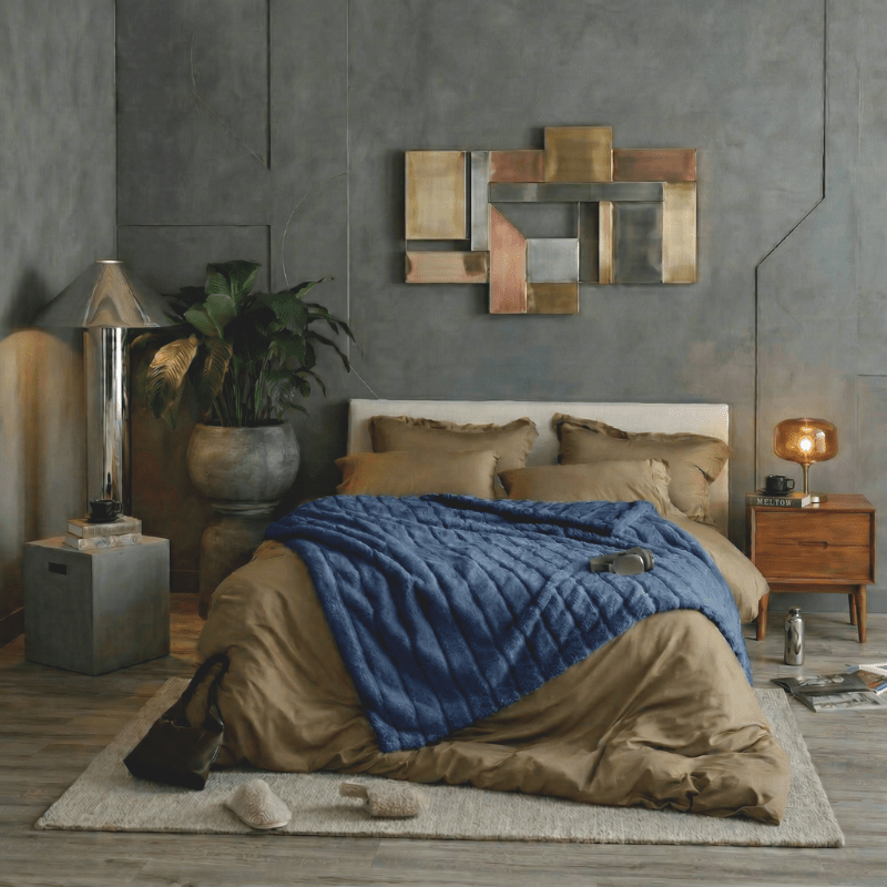 Cozy Bliss faux fur blanket styled on a modern bed, creating a cozy and moody bedroom atmosphere #color_Navy Blue