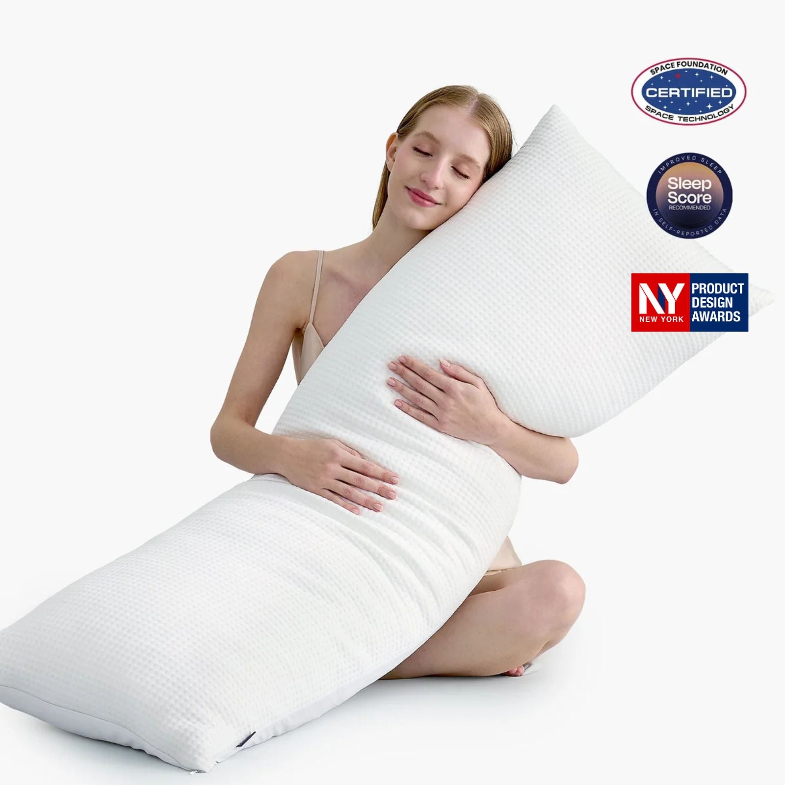 Women hugging body pillow with space station and sleep score certifications. #color_Off White