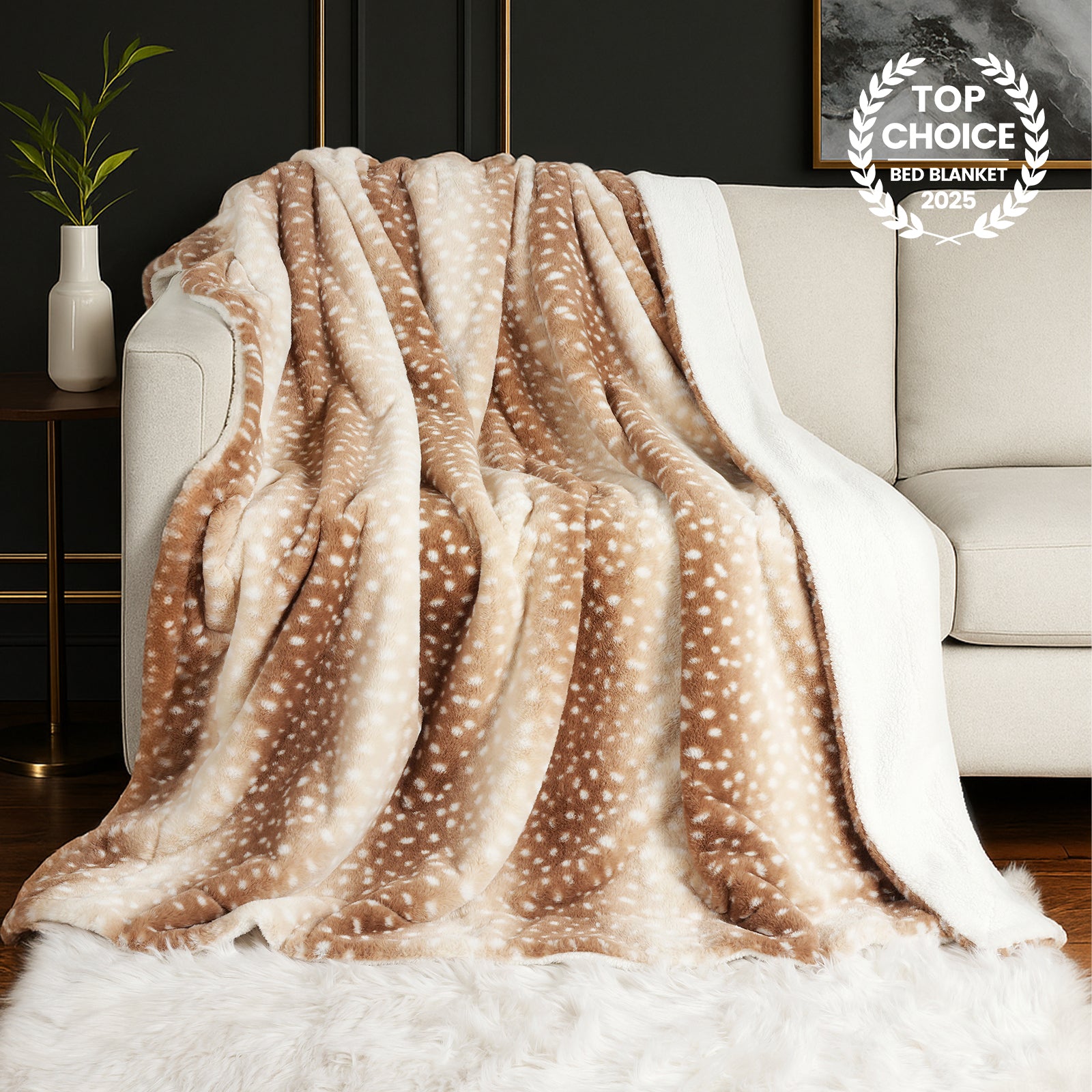 Faux fur blanket with deer pattern draped over a sofa #Color_Brown Fleece Deer