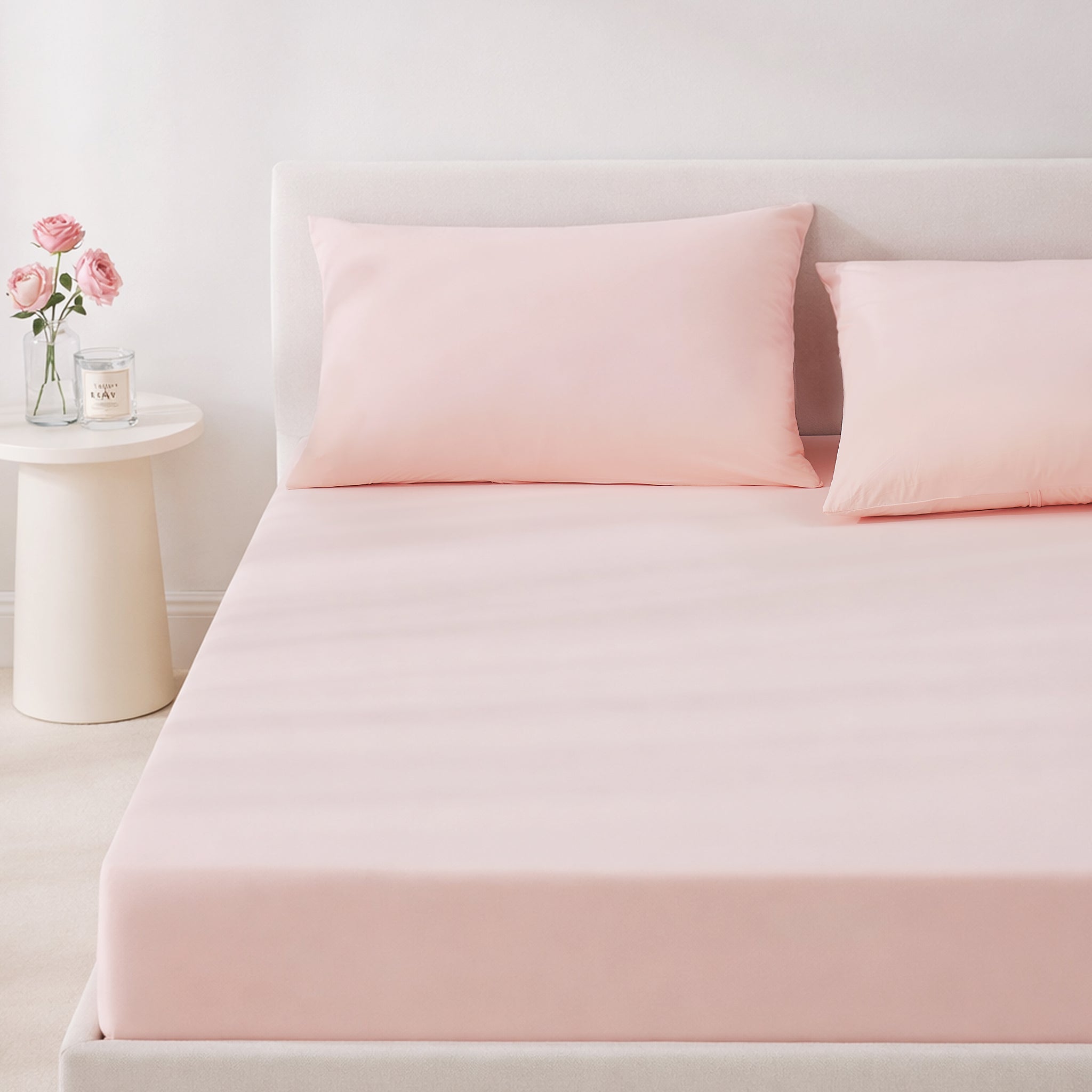 Pink cooling bedding set on a bed in a minimalistic bedroom setting.#color_Pink