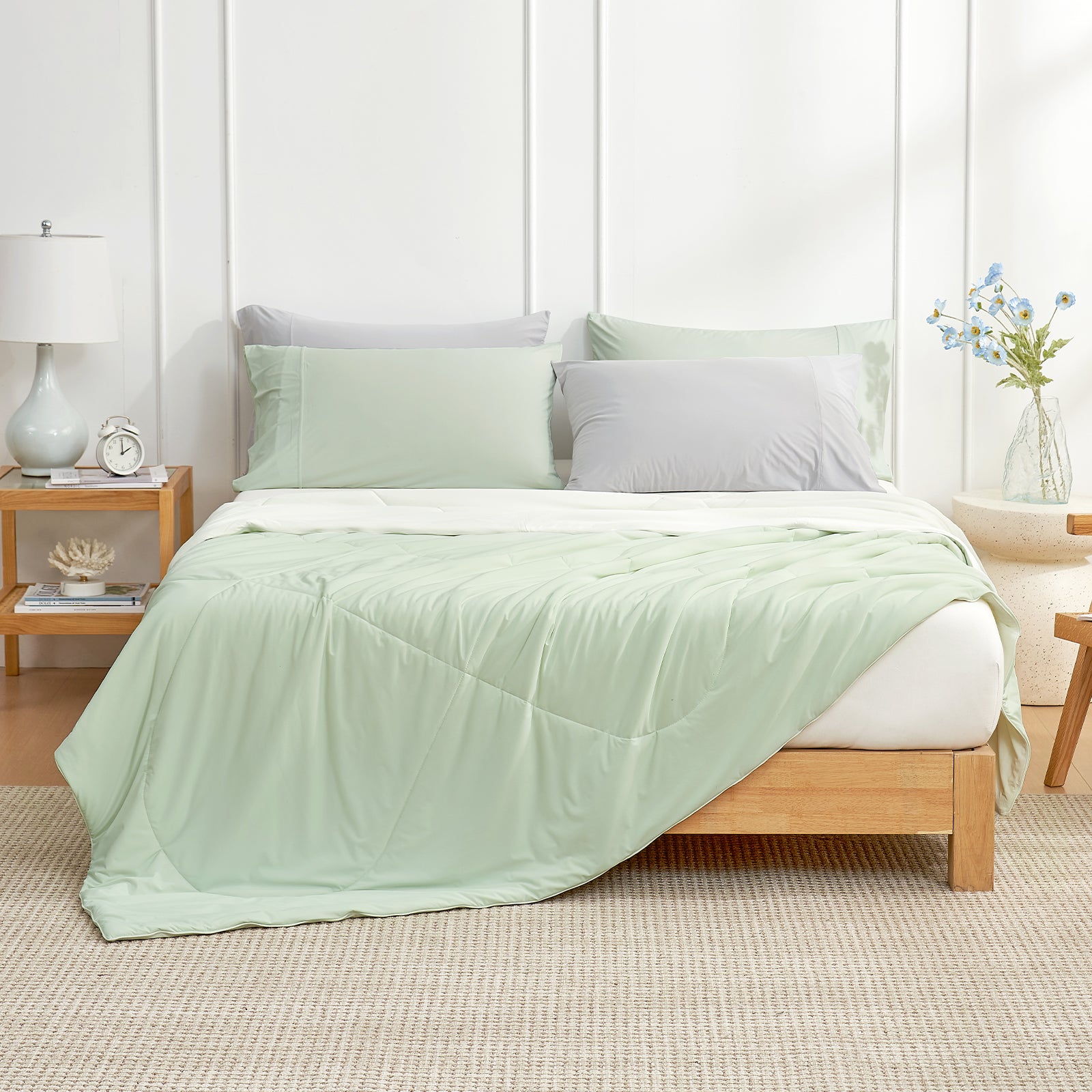 Cozy bedroom with light mint green/cream cloud-like extra cooling comforter, soft breathable bedding in a comfortable sleep setting. #Color_Light Mint Green/Cream