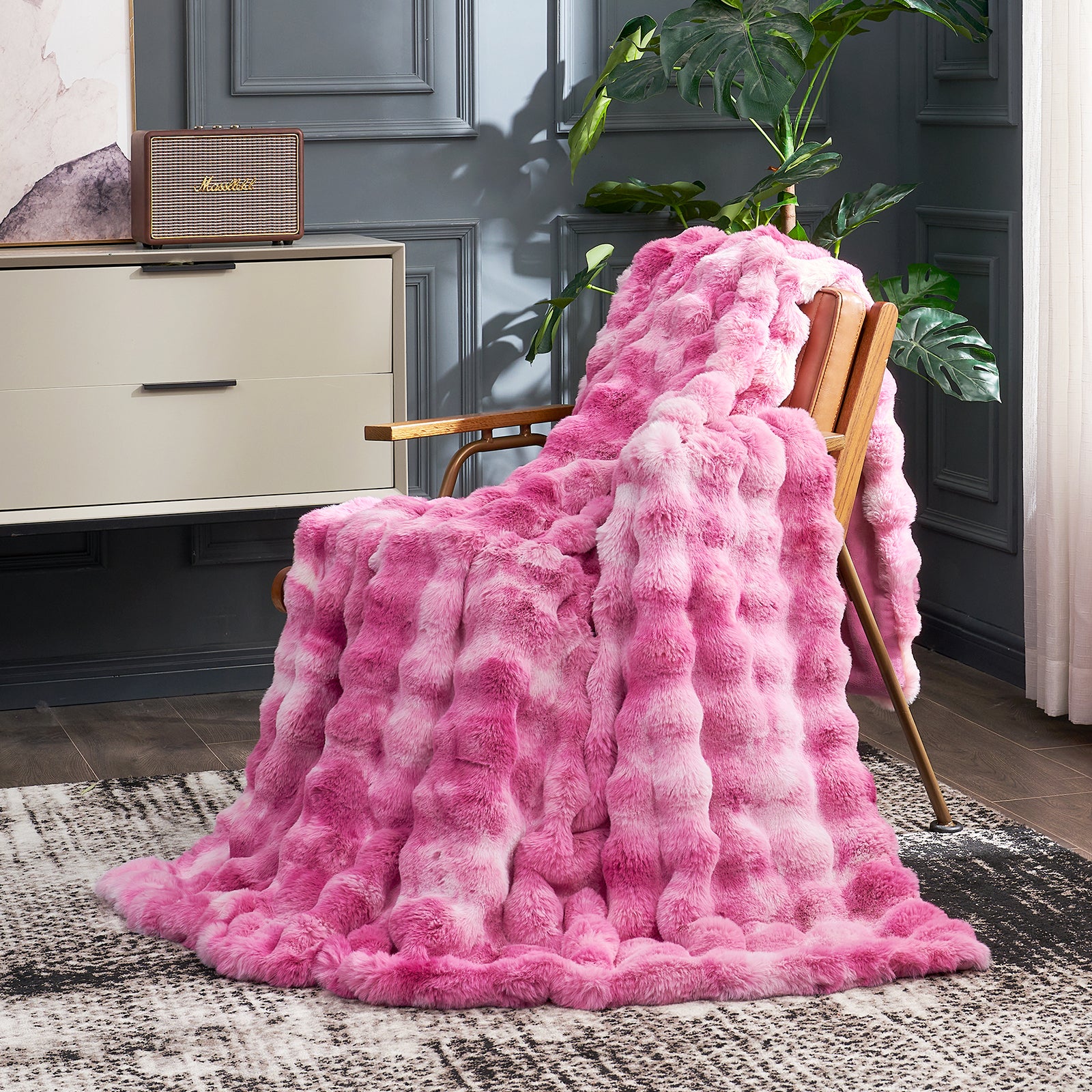 Cozy Bliss pink tie-dye faux fur blanket on chair, a soft and cozy blanket for comfort #color_Tie-dye Pink