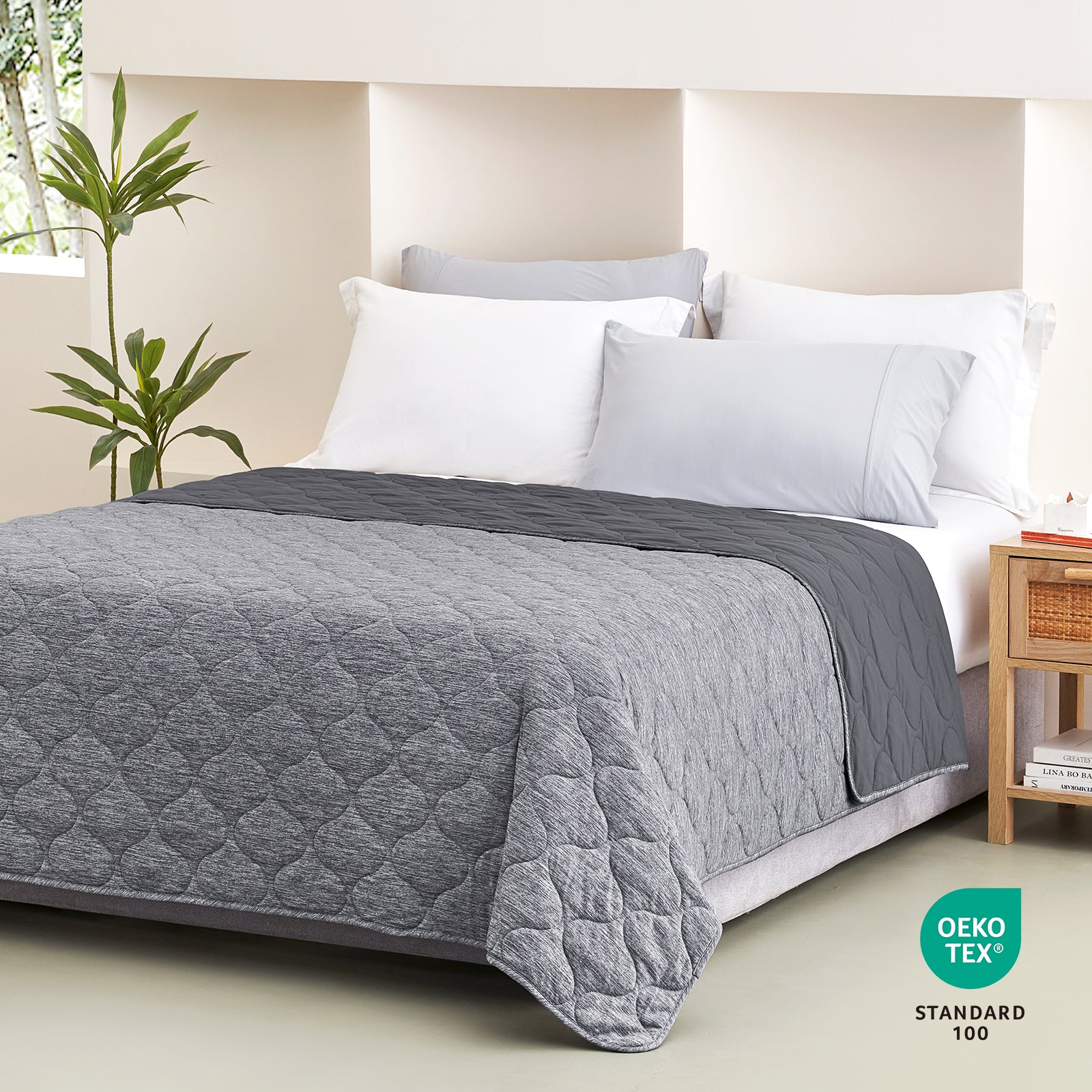 Cozy Bliss gray cooling blanket with cloud pattern on bed, OEKO-TEX certified, for cozy sleep #color_Charcoal Grey