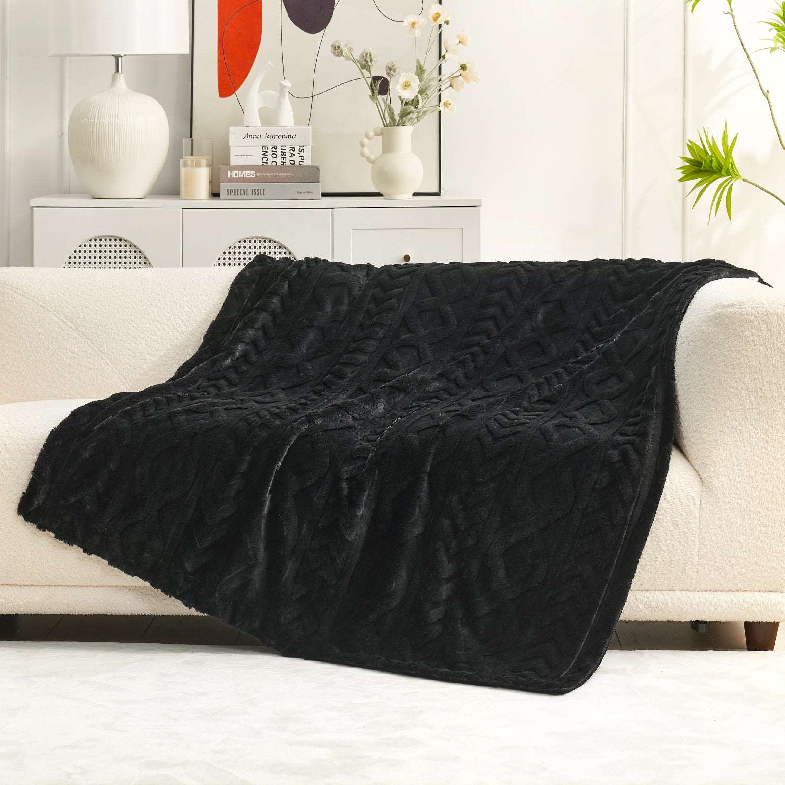 Black cable knit faux fur throw blanket on white sofa, cozy home decor, soft blanket for comfort #color_Black