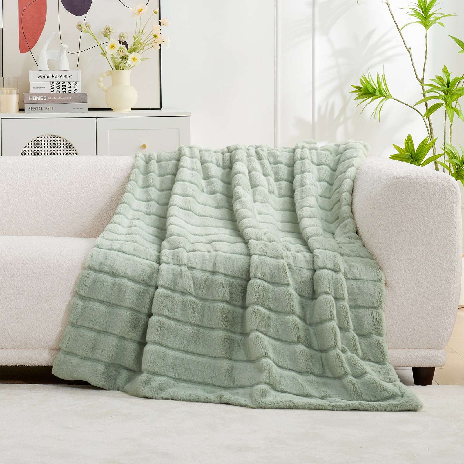 Cozy Bliss green faux fur throw blanket on white sofa #color_Sage Green