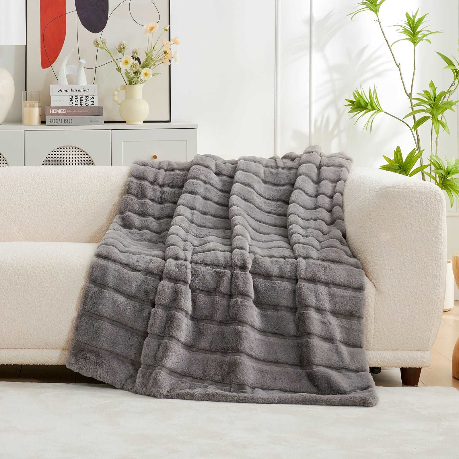 Cozy Bliss Sheared Faux Fur Throw Blanket, grey blanket on sofa #color_Grey