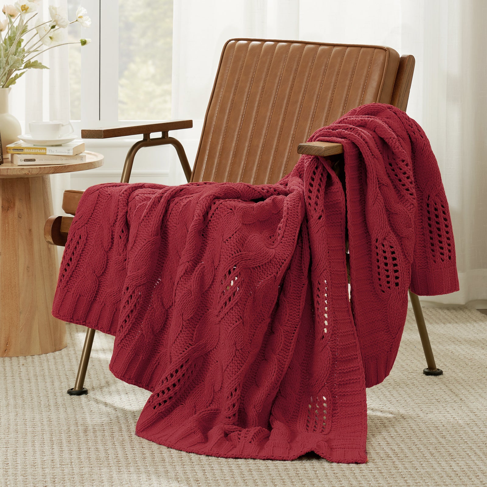 Chenille Cable Knit Throw Blanket in Red front view draped over an armchair, showcasing rich color and soft cable knit texture. #color_Christmas Red