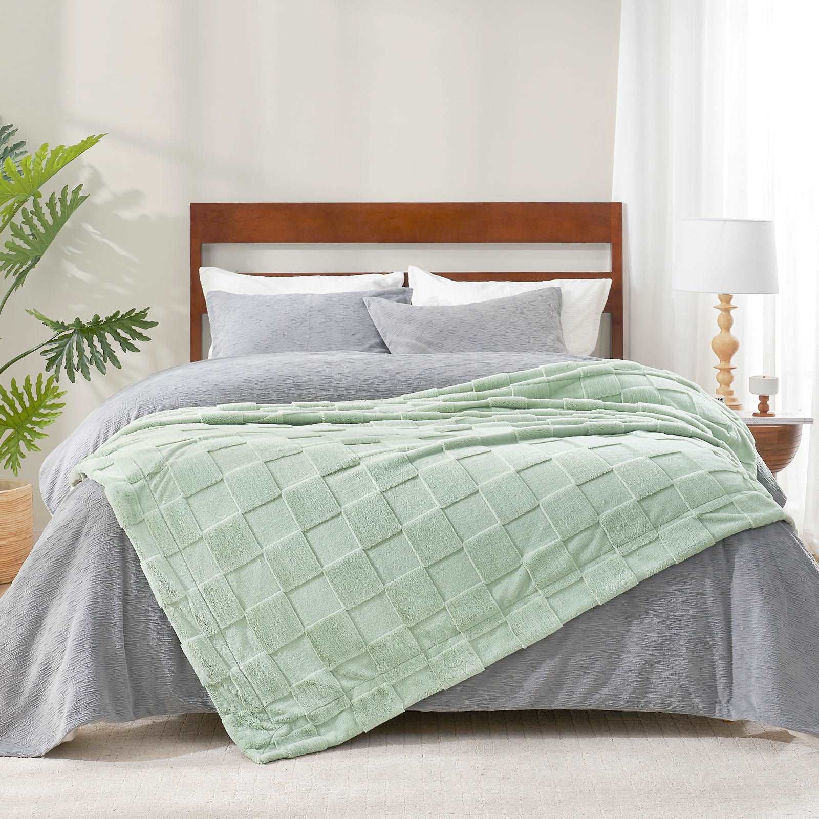 Green checkboard faux fur blanket on bed, cozy bedding #color_Sage Green