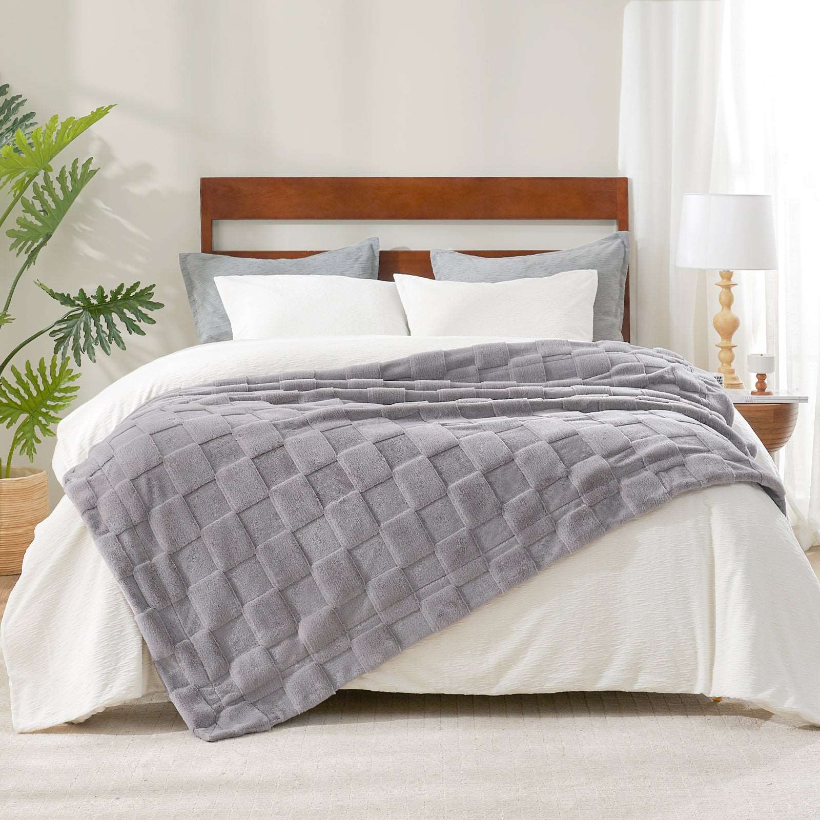 Grey checkerboard faux fur throw blanket on bed, cozy bedding for modern home decor #color_Grey
