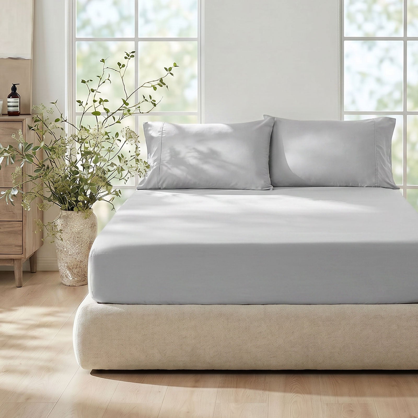 Cozy Bliss Light gray cooling sheet set with pillowcases on a bed in front view#Color_Light Grey