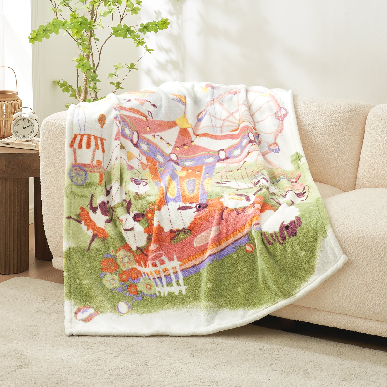 Colorful cartoon blanket draped over a beige couch in a living room setting. #color_Lamb Playground