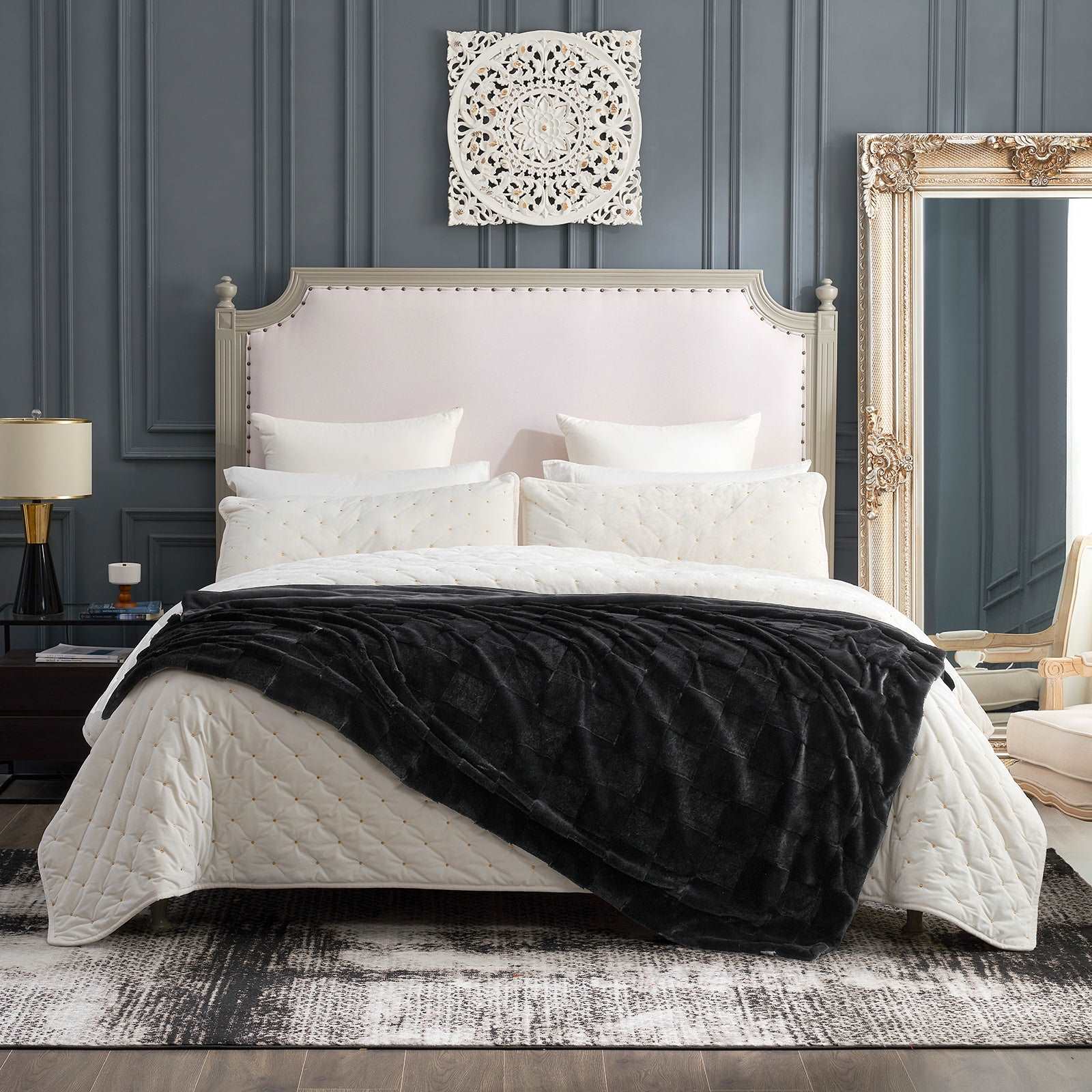 Cozy Bliss black faux fur throw blanket on bed, perfect for adding warmth and style to any bedroom decor #color_Black