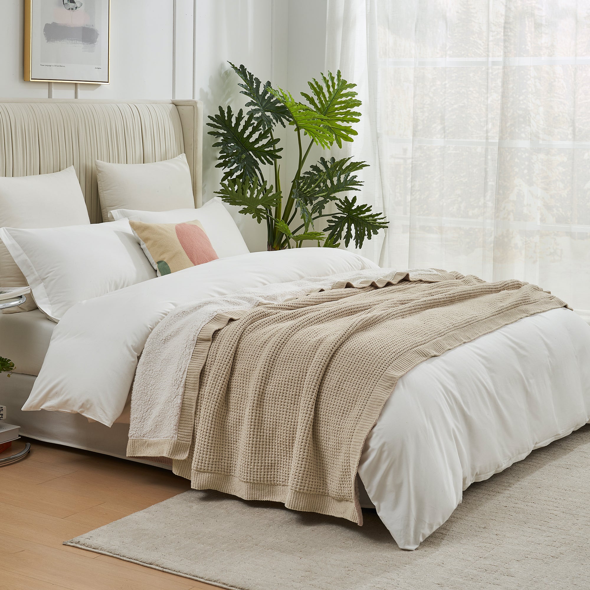 Neatly made bed with beige and white bedding in a bright bedroom. #color_Beige