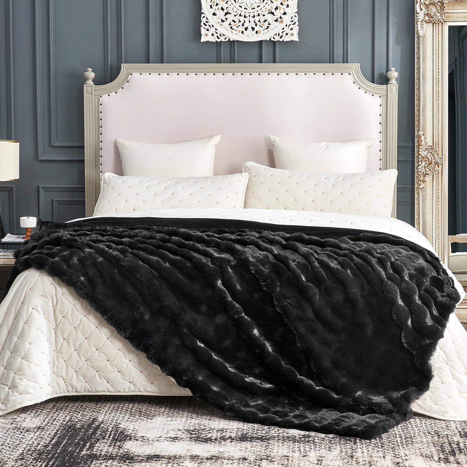 Cozy Bliss black faux fur throw blanket on a bed, luxurious and cozy, soft blanket #color_Black